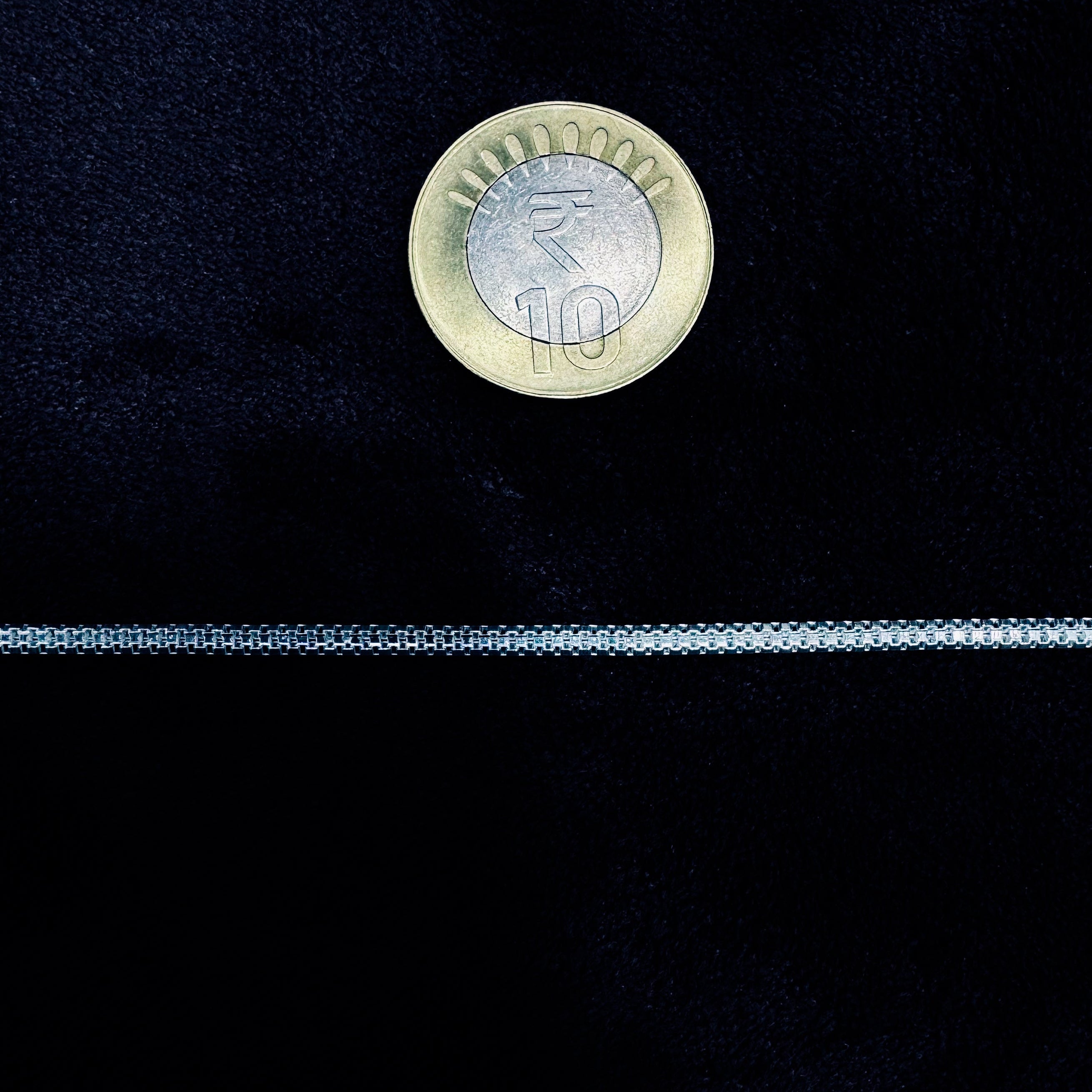 100 Euro coin on a black background